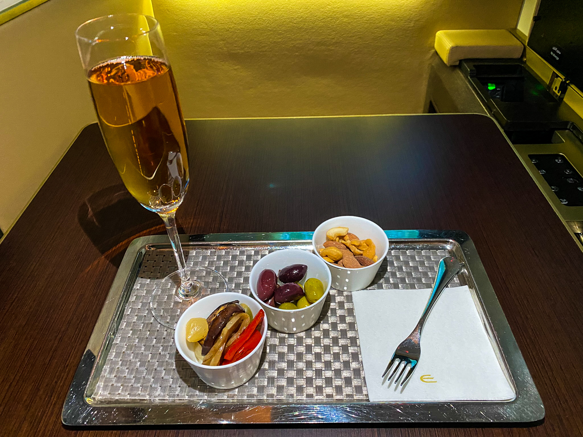 Etihad first class canapes and Rose Champagne