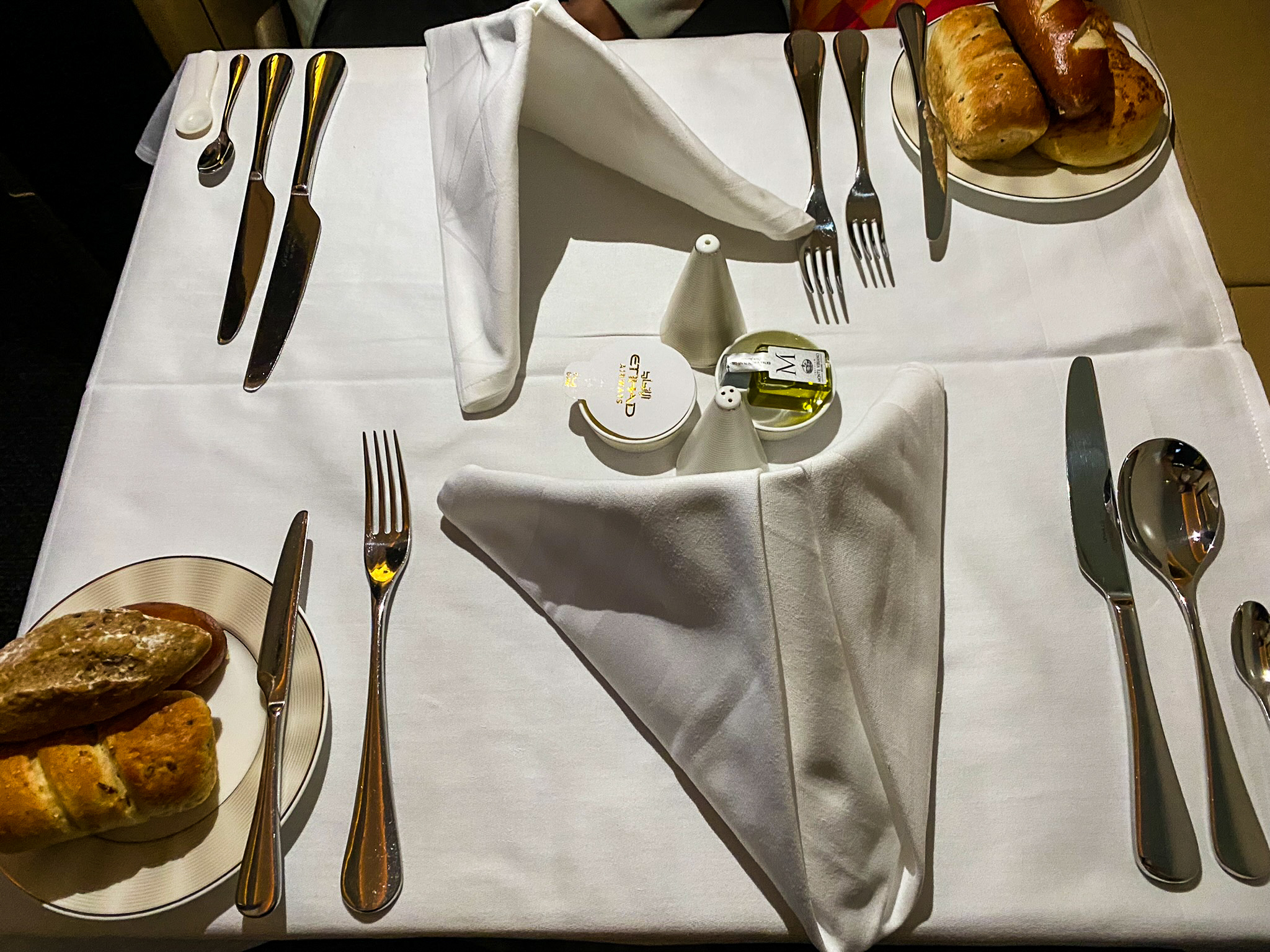 Etihad first class table setting with companion dining