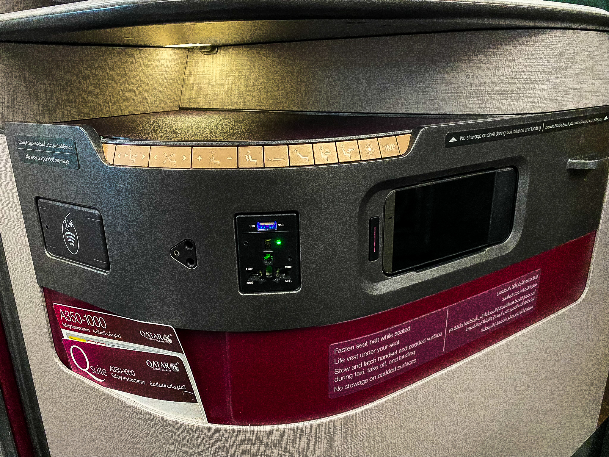 Qatar Airways Qsuites seat controls and outlets