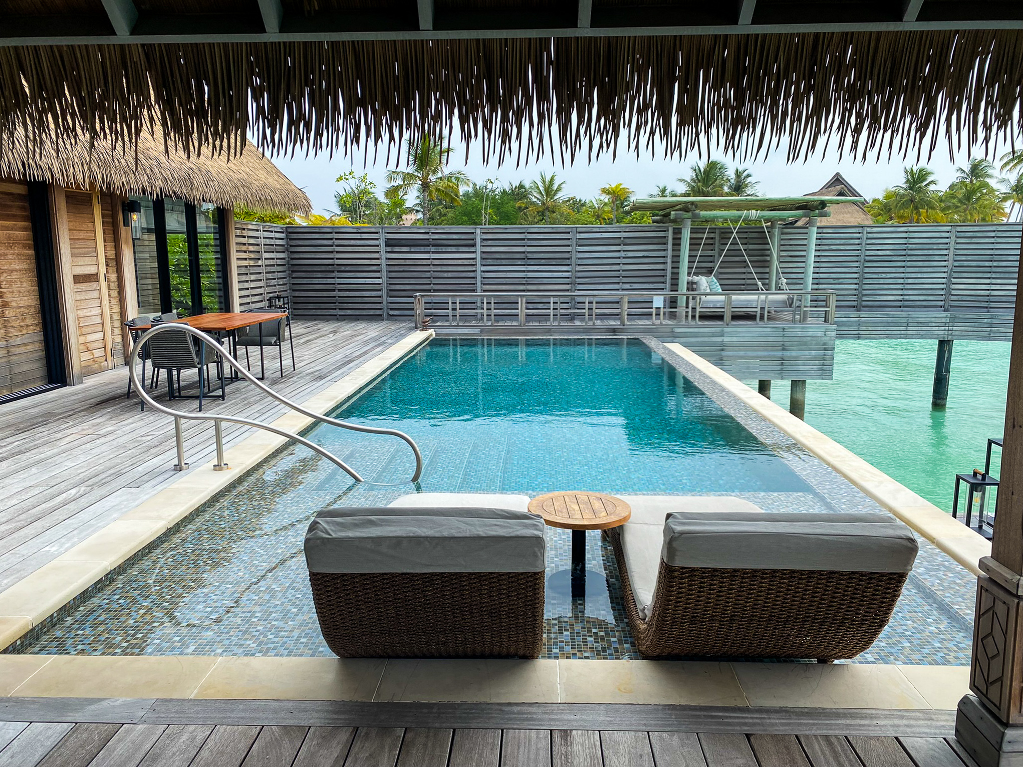 Waldorf Astoria Maldives Ithaafushi king reef villa daybeds and pool