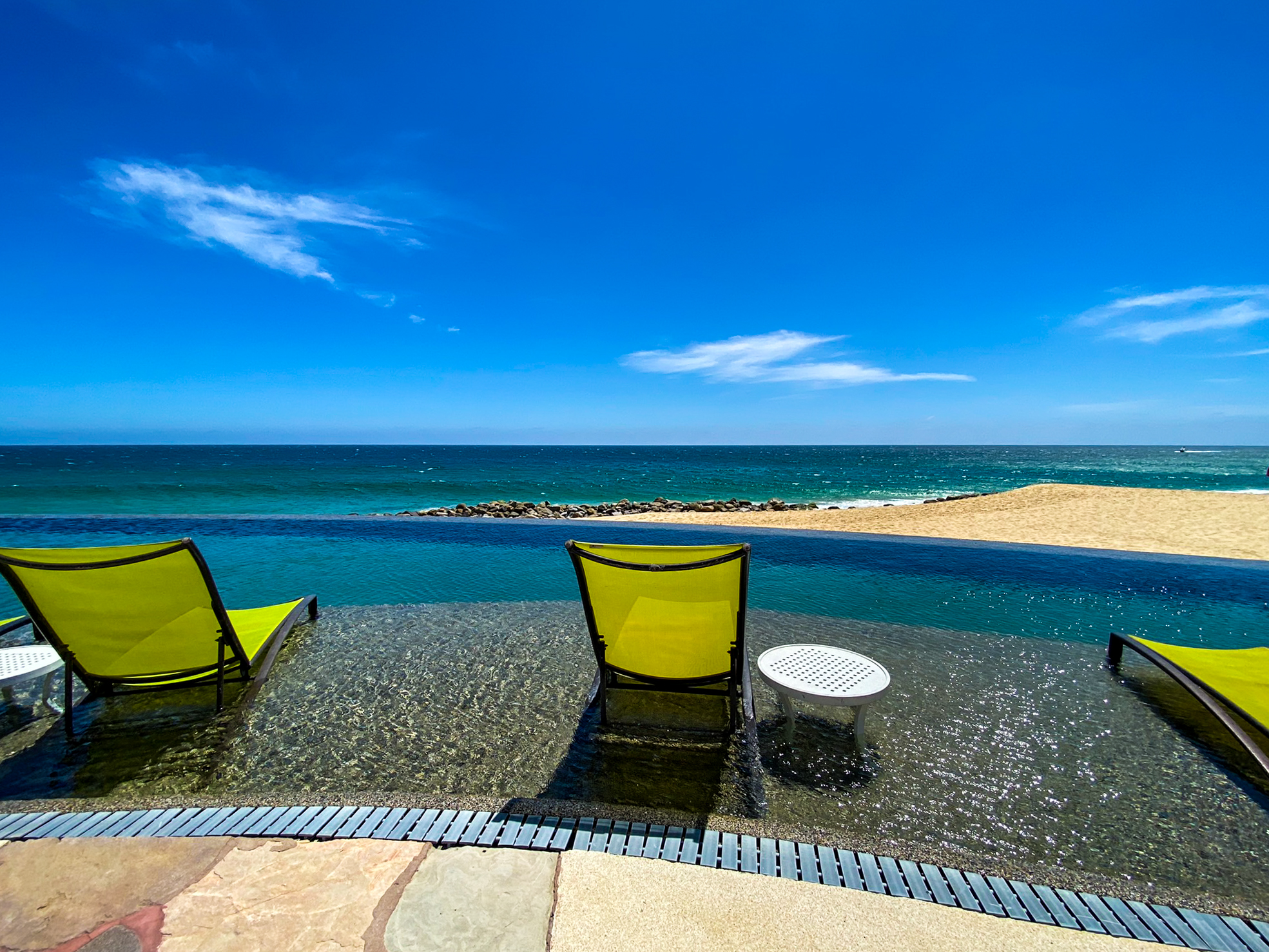 Waldorf Astoria Los Cabos Pedregal The Beach Club infinity pool seating