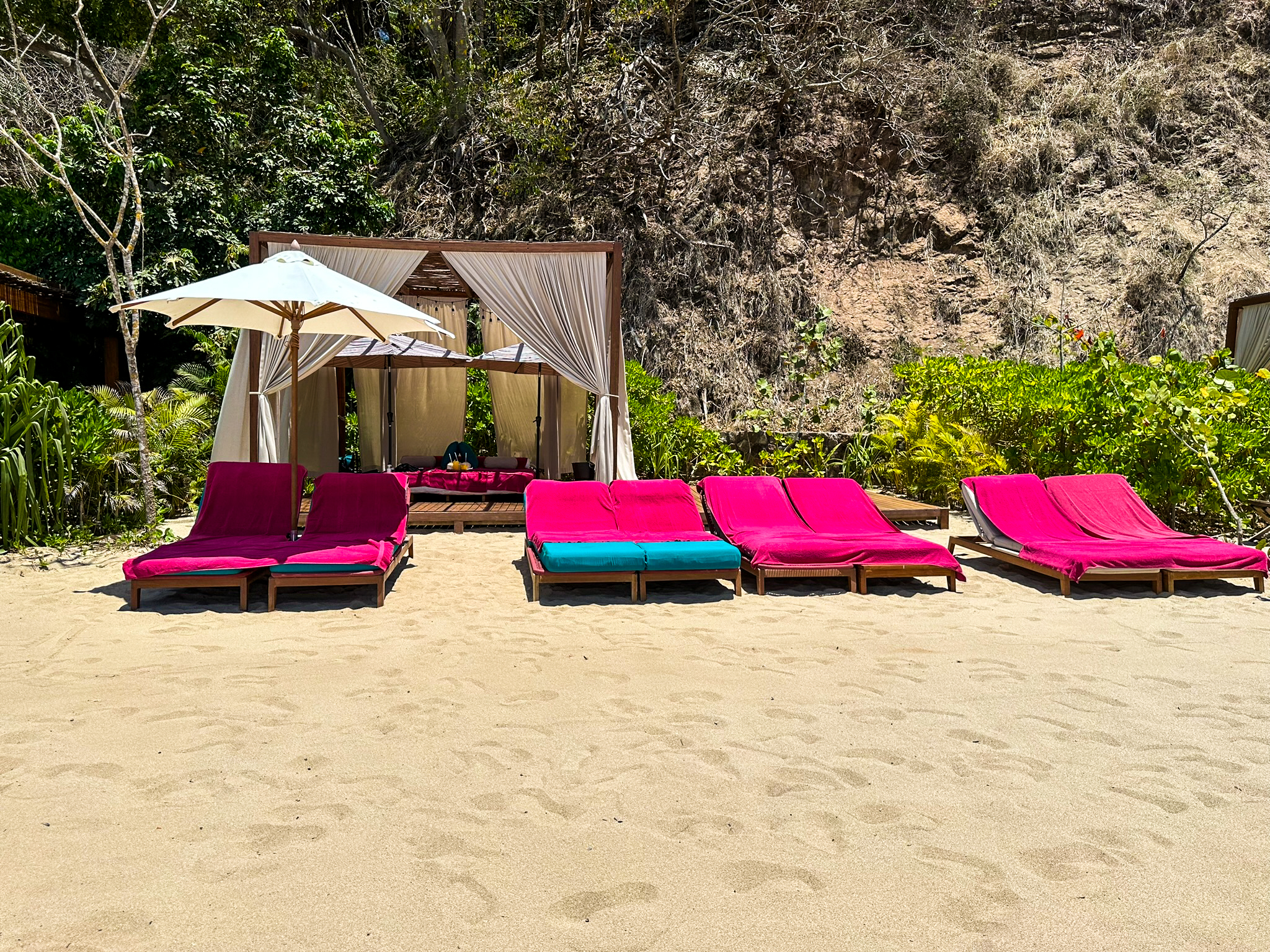 One&Only Mandarina Jetty Beach Club cabanas and sun loungers